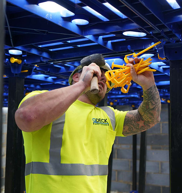 QDeck installer securing safety decking platform